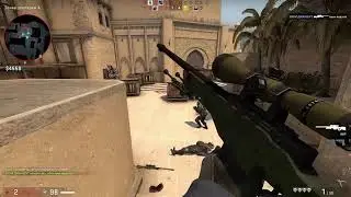 Играю в Counter-Strike Global Offensive с друзьями.