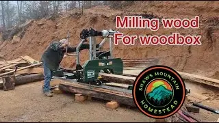 Milling logs into lumber for cabin siding & rustic firewood box. Woodland Mills sawmill. Log cabin