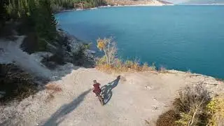 Picturesque Bike Ride through the Rocky Mountains - Drone Footage