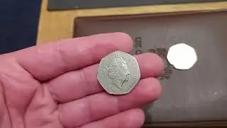 Super weak strike People Act and Britannia planchet error 50p coin