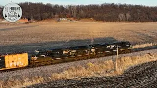 Sunset drone catch of NS 120 as the crew coordinates with the dispatcher for lights at CA Junction