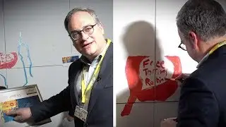 SEE Ezra Levant's #FreeTommyRobinson graffiti at Defend Media Freedom Conference, London, UK