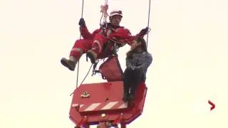 Woman rescued from crane in Toronto arrested for mischief