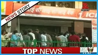 Long queue of people outside ATM and Banks