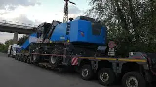 Esser Schwertransport Volvo FH 16 750 mit 8 Achser Nooteboom Tieflader Fuchs Terex MHL 390
