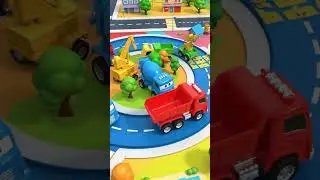 Top-down view of trucks moving in circles, colorful ground, playful electronic kids music