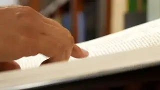 Reading an old Book 03 / Free Stock Footage (4K)