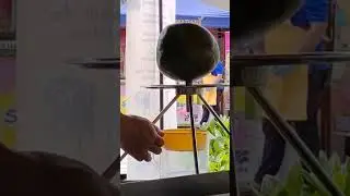 Simple and fast method to extract young coconut water manually. #cocoman #coconutmachine
