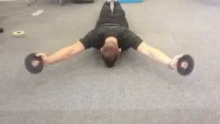 Shoulder stability: weighted prone W-Y raise.
