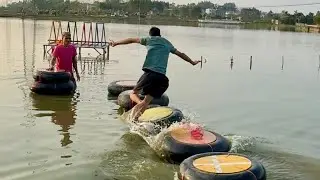 Young Man Runs on Floating Bridge and Falls into Water, Making Everyone Laugh