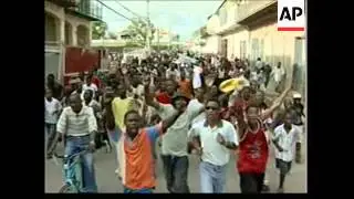 Celebrations in Haiti's second city after Aristide departure