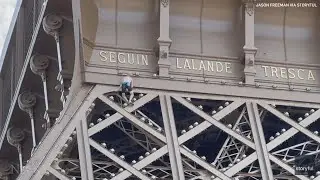 Man scales Eiffel Tower ahead of closing ceremony