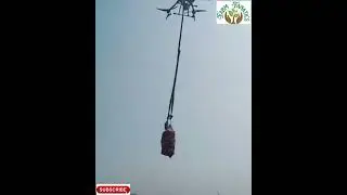 Getting bags from field with the help of Drone