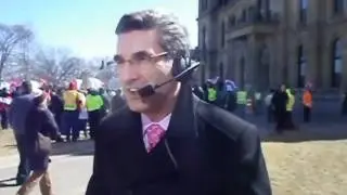 CBC host Harry Forestell reports in front of New Brunswick Legislature on 2012 Budget
