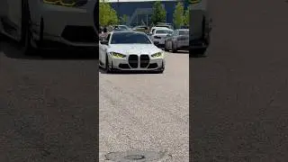 CRAZY bmw M4 Competition in Frozen white with yellow headlights.