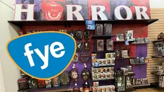 Поиск игрушек в магазине FYE