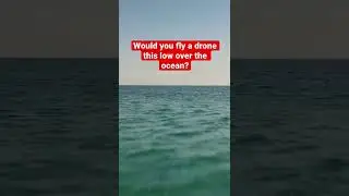 Drone Flying Low Over the Ocean