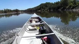 Smooth water canoeing with motor.