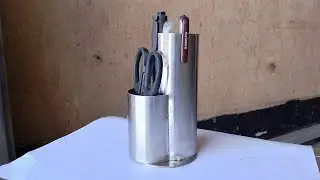 Custom-made stainless steel pen holder.
