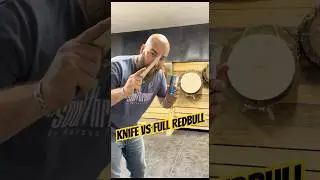 World Champion Knife Thrower vs Full Redbull Can
