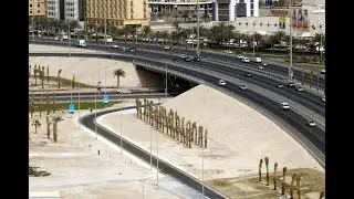 Bahrain desert areas construction stages of development Bridge and road.