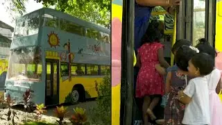 Old buses turned into activity rooms at Indian primary school | AFP