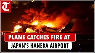Plane catches fire on runway at Japan's Haneda airport after collision, passengers reportedly safe