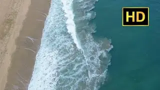 Beach Waves Crashing Against Shore - Aerial View Drone Footage - Free Stock Footage