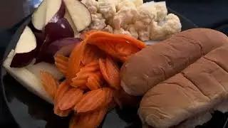 Hot dogs, apples, carrots and cauliflower for lunch