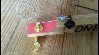 Esso motor oil can guitar made by One String Is Enough - How to build a 1-string guitar - DIY