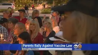 Protesters Step Up Campaign On Day That New State Vaccine Law Takes Effect