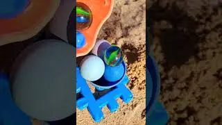 Sandbox Ice Cream Cone Full of Marbles Reversed