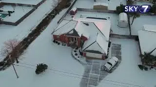 Drone footage shows snow turn Lynn Haven into storybook winter town
