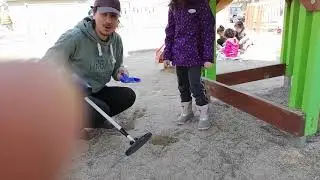 little girl and his dad found a treasure with metal detector :)