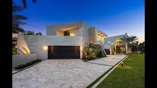 Waterfront tropical modern house for sale in Boca Raton, Florida.
