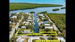 Coldwell Banker Schmitt Real Estate Co. - 1112 Grand Street, and Half Lot