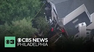 Car crashes into apartment building in Mount Laurel, New Jersey