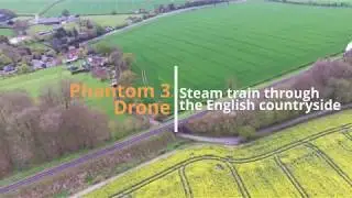 Steam train passing through the English Countryside
