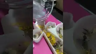 Pouring an epoxy resin cross with florals!