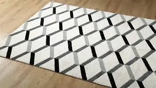 Sigrun Geometric Chevron Area Rug in Black and White