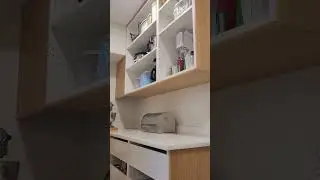 A walk-in pantry with all IKEA kitchen cabinets frames and VEDHAMN doors