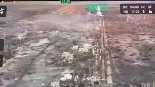 Bradley fires from a 25 mm gun at a Russian armored personnel carrier