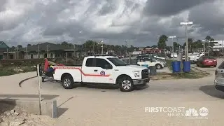 Lifeguards post double red flags to warn beachgoers of no swim order in St. Augustine Beach