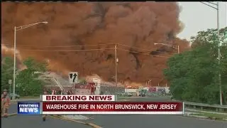 N.J. warehouse fire burning out of control