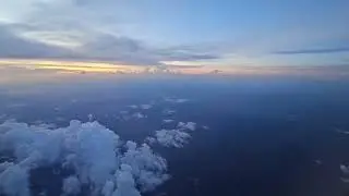Stunning Sunset from 30,000 Feet: A Dreamy Airplane Window View Experience for Travel Lovers