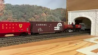 Long Conrail Freight With Lots Of Power At The Tunnel