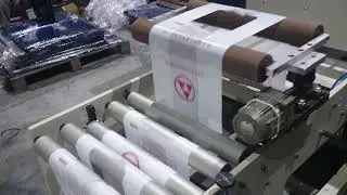 Fully Automatic High Speed 2 Line T Shirt Bags On Roll Making Machine(STBSR-40) - COSMO MACHINERY