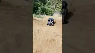 Travis Pastrana jumps his CanAm over Kris Meeke at the Channel 199 compound!