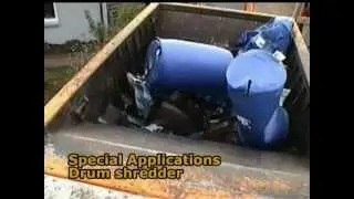 Mobile M&J EtaPreShred 4000 waste shredder in action - shredding drums