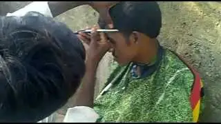 Haircut on the Mumbai street shot by Vijay Deepak Chhibber